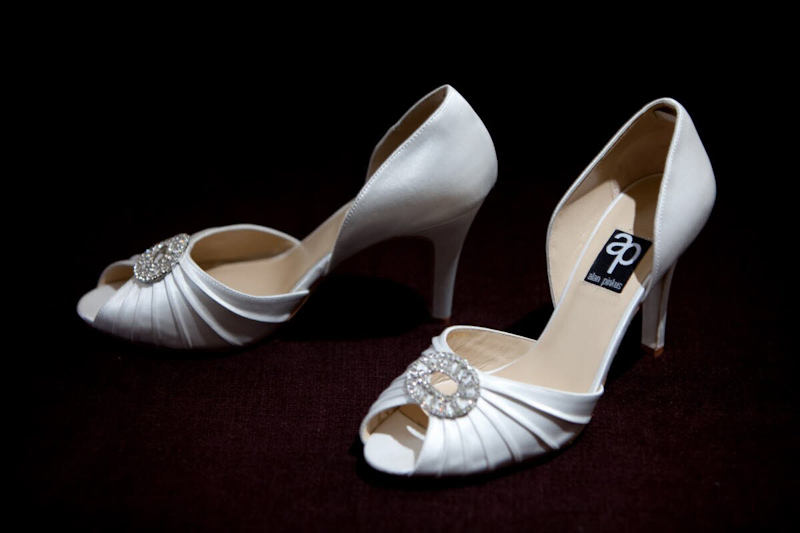 White opened toe wedding shoes with rhinestone accent - photo by South Africa based wedding photographer Greg Lumley